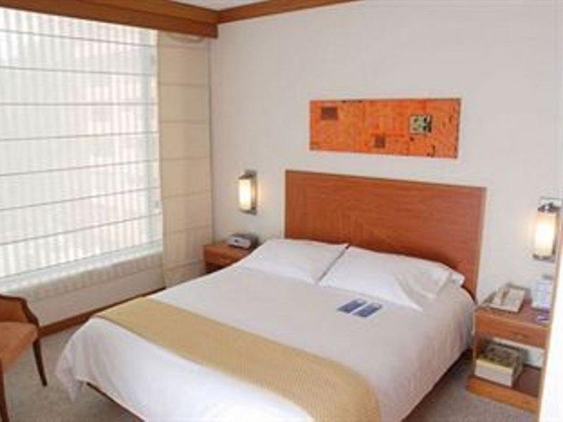 Nh Collection Bogota Andino Royal Hotel Luaran gambar A bedroom